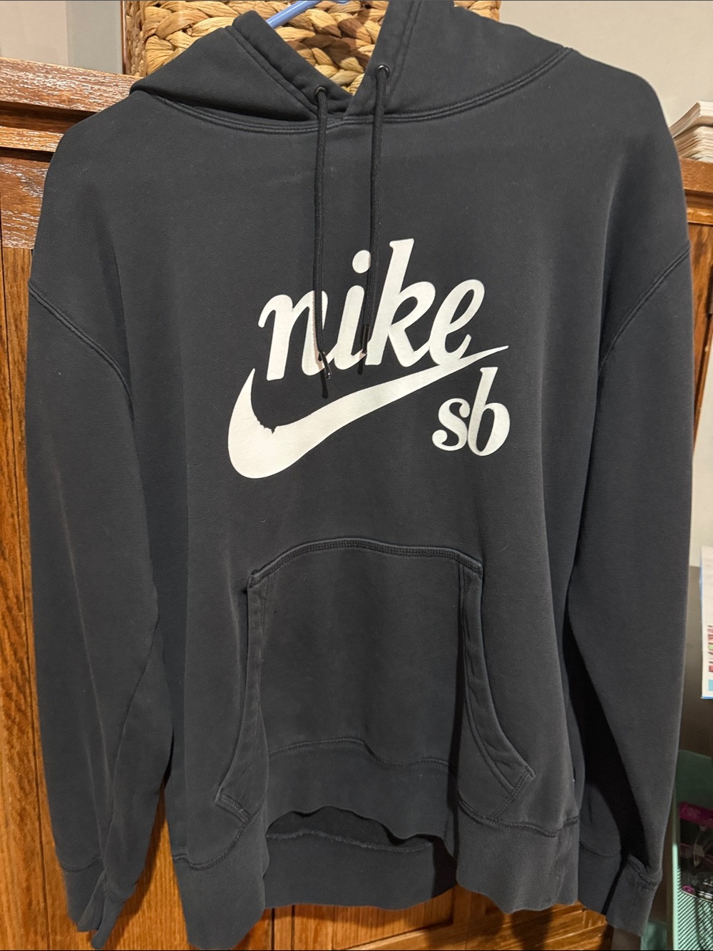Nike Men's SB Crewneck Hoodie in Black with White SB Logo.